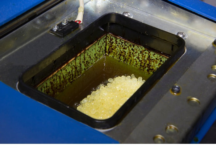 Technical Guide: Preventing Adhesive Char Formation in Hot Melt Systems